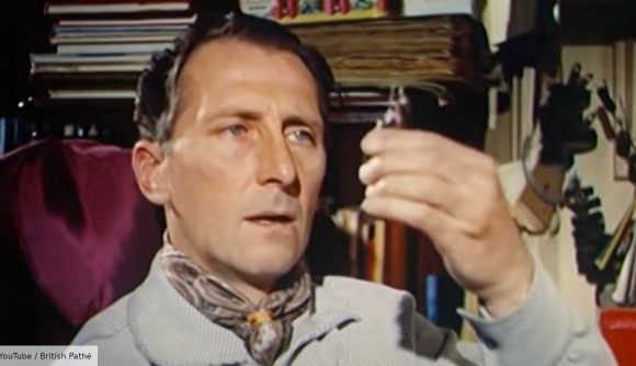 Star Wars Peter Cushing was a miniature wargamer - screenshot from British Pathé video about Peter Cushing, showing him inspecting a napoleonic miniature up close
