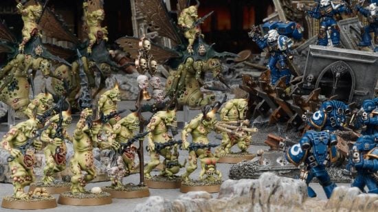 Warhammer 40k Chaos Daemons guide - Games Workshop photo showing a troop of Plaguebearers