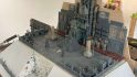 Details on Daniel McGirr's second Warhammer 40k Golden Throne diorama - a throne atop a small pyramid laden with candles, flanked by columns and strange machinery