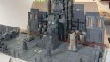 Details on Daniel McGirr's second Warhammer 40k Golden Throne diorama - a throne atop a small pyramid laden with candles, flanked by columns and strange machinery