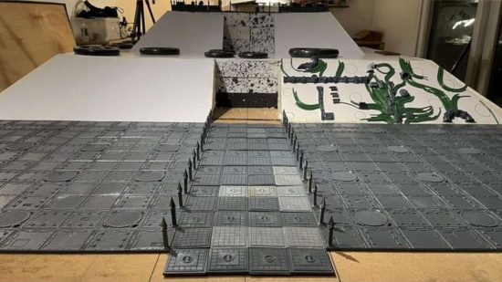 Details on Daniel McGirr's second Warhammer 40k Golden Throne diorama - a five foor square diorama with plastic industrial tiles reaching to a styrofoam ziggurat covered in arcane cables and gothic masonry