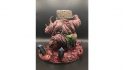 Swine Prince from Darkest Dungeon converted from a Nurgle Daemon - the back of a grotesque, rotting beast wielding a huge rusted cleaver, rising from a pile of offal