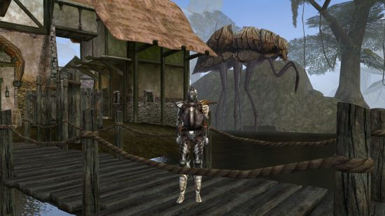 Best CRPGs guide - game screenshot from The Elder Scrolls 3 Morrowind, showing a character on the bridge at Seyda Neen, with a Silt Strider in the background