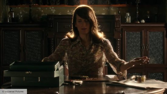 Image of a medium using a ouija board in Ouija: Origin of Evil, one of the best board game movies