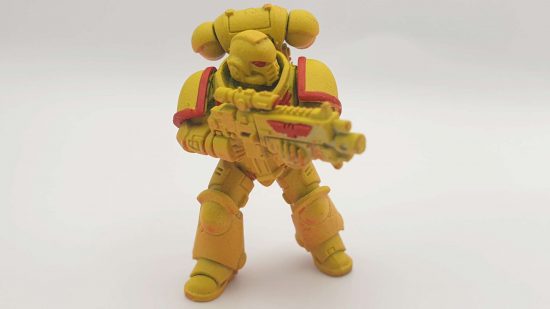 Painting Space Marines - a yellow Imperial Fist with some red base layers applied