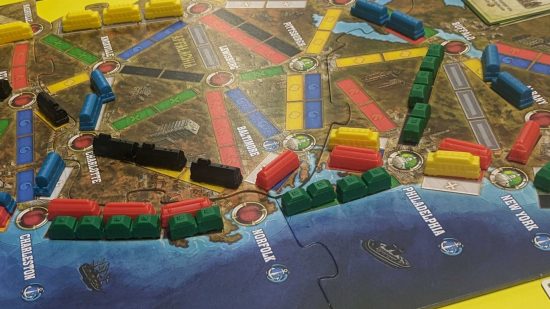 Close-up of a game of Ticket to Ride Legacy