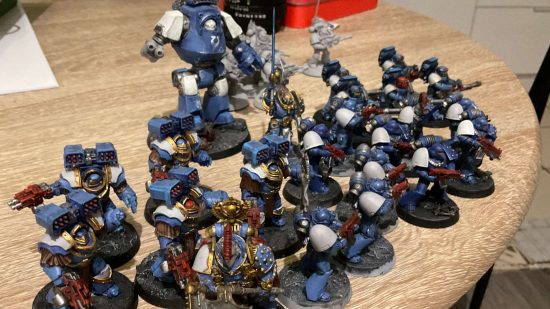 Warhammer 40k fan and wheelchair user Filip's Horus Heresy Ultramarines army, blue, white, and gold power-armored warriors