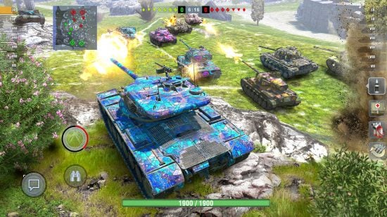 Best free war games online guide - World of Tanks Blitz screenshot showing several brightly colored tanks with WOT blitz skins applied