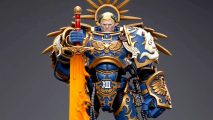 Best Warhammer 40k action figures guide - sales photo showing the JoyToy primarch Roboute Guilliman action figure in full color on a gray background