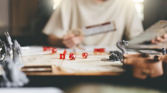 How science proved DnD doesn't harm your kids - stock image of people playing DnD with dice, maps, and miniatures