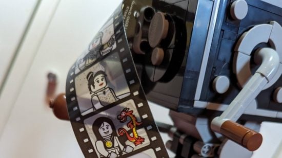 Lego Disney 100 Walt Disney Tribute Camera review image showing film that showcases various Disney films.