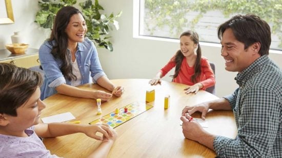 How to play Pictionary - photo of a family playing Pictionary