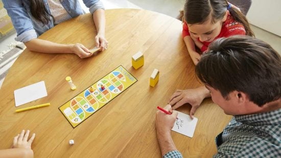 How to play Pictionary - photo of a family playing Pictionary