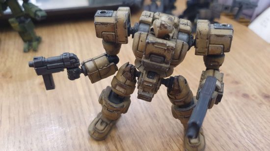 Well-armed mecha with two submachine guns from the wargame Eisenfront