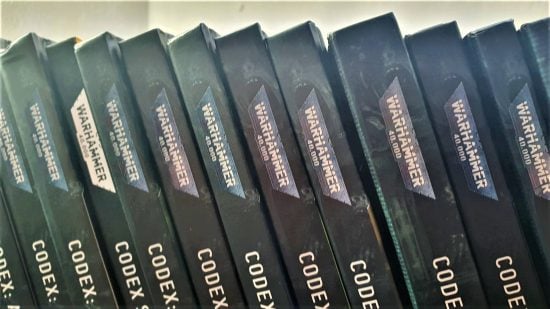 Warhammer 40k codex release dates guide - Wargamer image showing a row of Warhammer 40k codex books on a shelf
