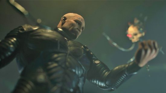 Warhammer 40k female space marines final decision - Games Workshop animation screenshot showing a Space Marine partway through armoring rituals, with the Black Carapace visible, and a hovering servo skull