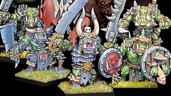 Warhammer The Old World Orcs - multipart models by Avatars of War, a band of Orcs in crude armor wielding huge cleaver-bladed weapons