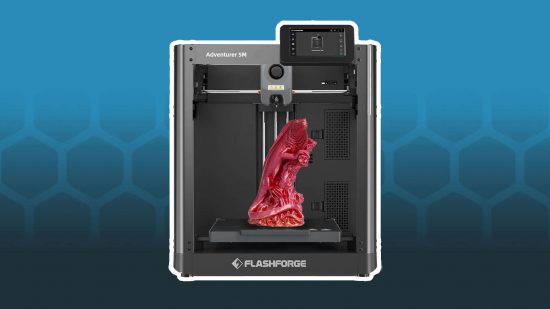 Adventurer 5M 3D printer - a black cubic model with a red statue of an iguana inside