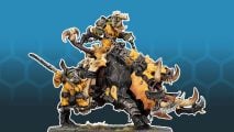 Age of Sigmar balance update boosts Orruk Ionjawz - a large pig covered in yellow and black armor, ridden by a huge Orruk