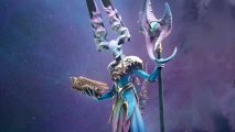 Artwork for DLC for the best Warhammer fantasy game of 2023, Realms of Ruin, showing a Gaunt Summoner - a wizardlike figure with blue robes, with its eyes spread around a pair of huge horns rising from the top of its head, holding a staff tipped with an eye and a manta-ray like structure