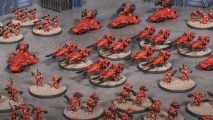 Miniatures from Warpath, Mantic Games' answer to Epic 40k - a large force of bright red Enforcers, heavily armored infantry supported by troops on jetbikes and anti-grav vehicles