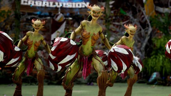 Blood Bowl3 Wood Elves - green Dryad cheerleaders holding red and white petal pom-poms