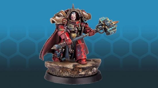 Gabriel Angelos, Chapter Master of the Blood Ravens Space Marines, wearing heavy red Cataphractii terminator armor and carrying a huge double-handed thunderhammer