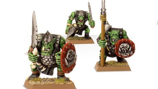 Warhammer the Old World Orcs and Goblins - Orc Boys, stooped greenskins with prominent underbites and tusks, wielding sturdy spears and shields
