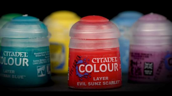 Several bright and colorful Warhammer paint pots
