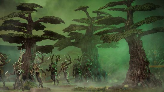 Warhammer the Old World Wood Elves Athel Loren - spindly wooden dryads walk between the trees of Athel Loren