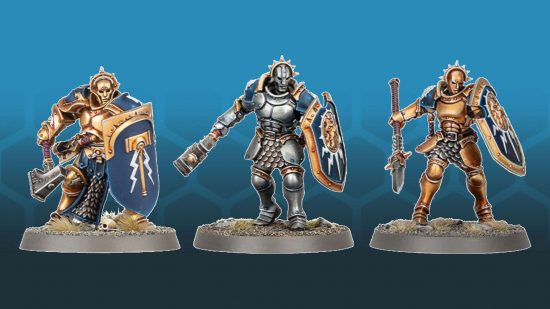 Age of Sigmar Stormcast Eternals, from left to right a 2015 liberator model in stocky gold armor, a 2024 Liberator in svelte silver thunderstrike armor, and a spear wielding Vindictor in gold thunderstrike armor
