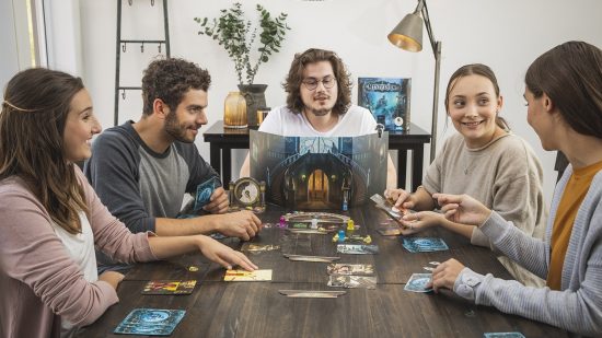 A group of friends playing the board game Esdevium, owned by Asmodee group