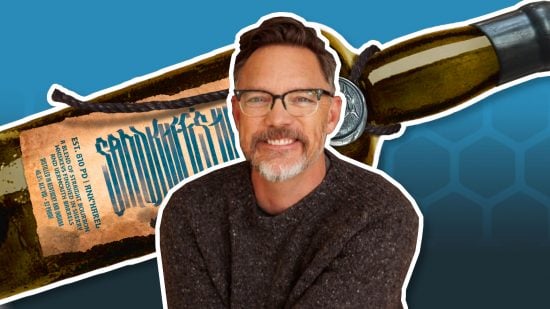A photo of Matthew Lillard, with an image of his new Critical Role whiskey in the background