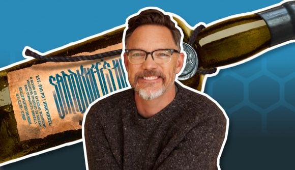 A photo of Matthew Lillard, with an image of his new Critical Role whiskey in the background