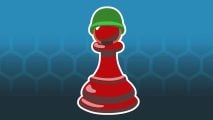 A red chess pawn wearing a green military helmet, representing a new tabletop wargames hub for the UK military