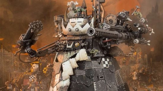 Warhammer 40k Orks codex - a Stompa, a colossal walking war machine covered in guns, with a massive chainsaw arm