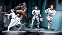 Star Wars Shatterpoint squad pack This Is Some Rescue, painted miniatures of Princess Leia in a white robe, Chewbacca, Luke Skywakler in white Storm Trooper uniform and Han Solo in a white Storm Trooper uniform
