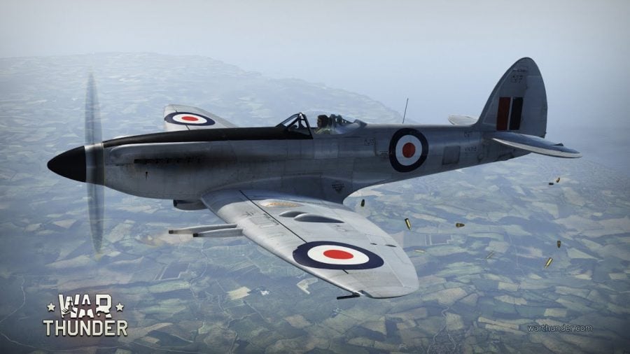 Spitfire War Thunder plane flying above a farms below
