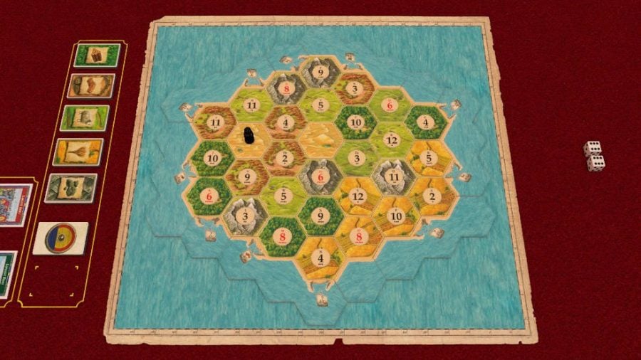 Resource cards lined up next to a board in Tabletop Simulator game Catan, with dice lying opposite