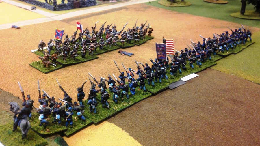 Photo showing Union and Confederacy soldier miniatures in an American Civil War tabletop miniatures wargame