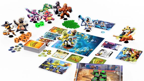 Photo of the pieces and contents from the King of Tokyo board game Monster Box edition - credit to W. Eric Martin / Boardgamegeek