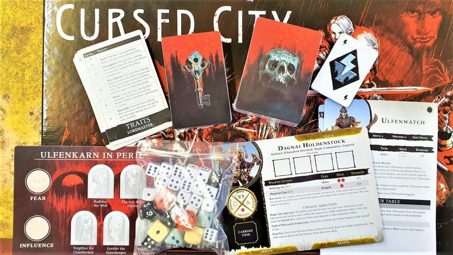 Photo showing the cards and dice included in Warhammer Quest Cursed City