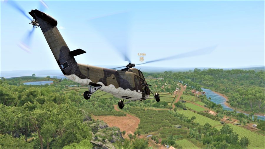Screenshot from Arma 3 Creator DLC SOG Prairie Fire showing a helicopter flying over a valley and river