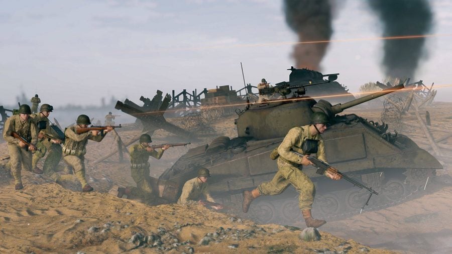 Enlisted tank guide infantry running beside a tank