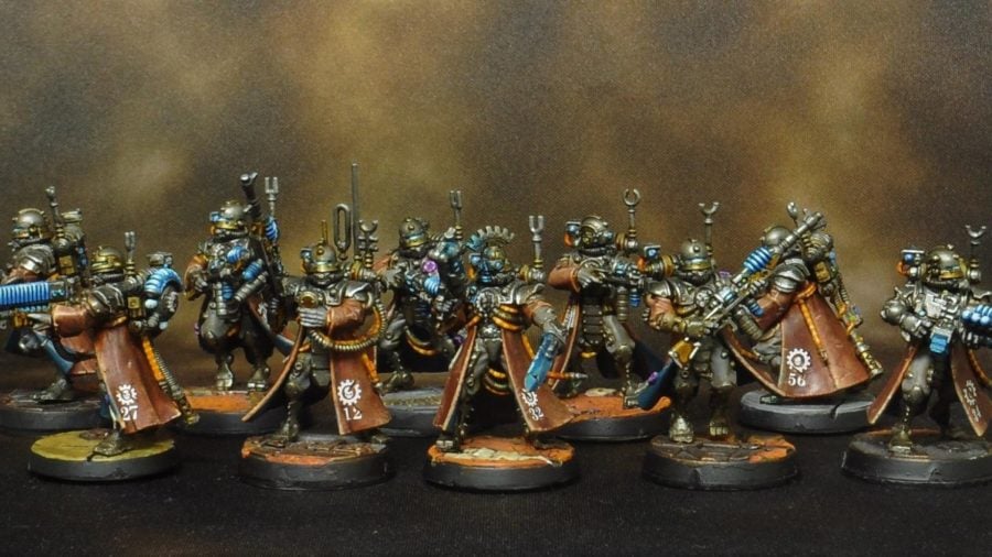 Warhammer 40k Adeptus Mechanicus 9th edition guide photo showing skitarii vanguard models with various weapons