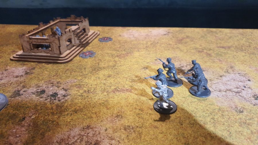 Bolt Action Pegasus Bridge review - photo showing British miniatures about to assault a German held bunker