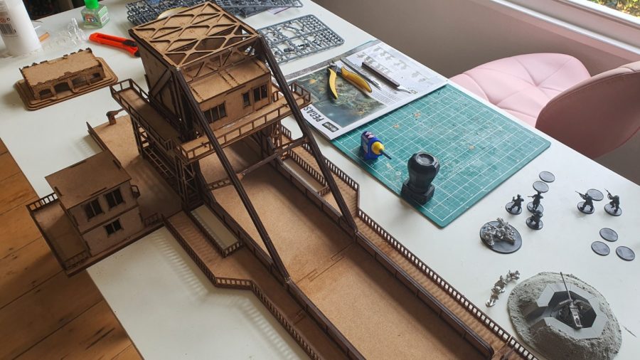 Bolt Action Pegasus Bridge review - photo showing the wooden Pegasus Bridge model part completed, with modelling tools