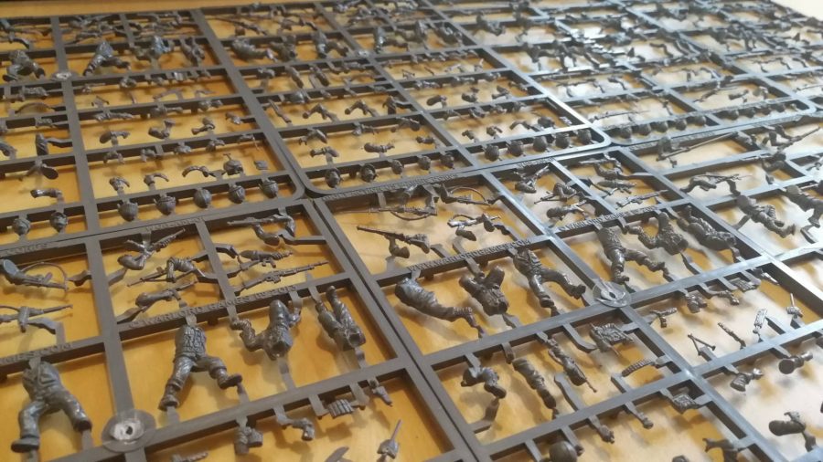 Bolt Action Island Assault starter set sprues laid out on a table
