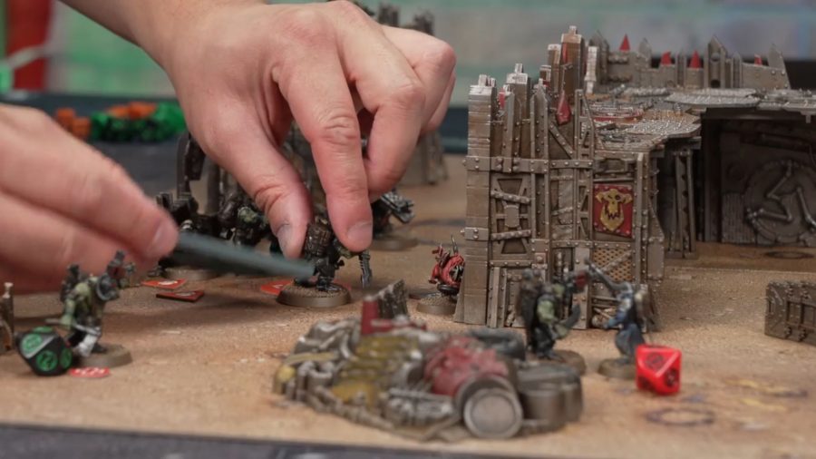 Warhammer Plus a screengrab of a Battle Report in which a player is moving their Ork Commando