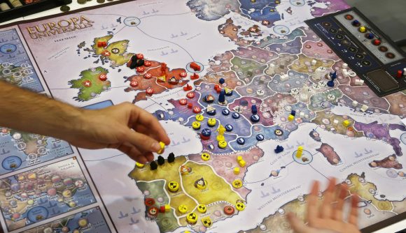 Europa Universalis: The Price of Power board game being played with tokens and board on a table